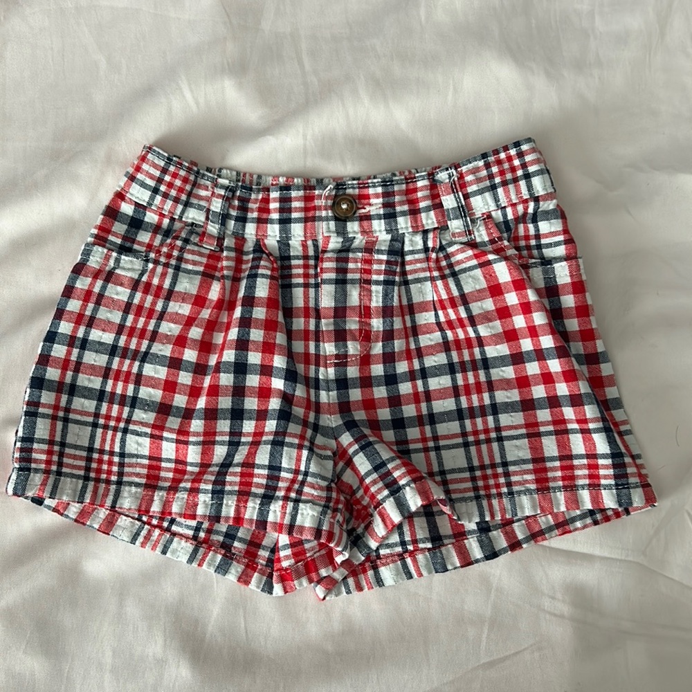 Carter’s size 7 shorts.  Red, white and blue perfect for summer